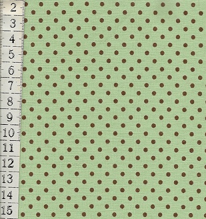 puntíky hnědé na zeleném  šířka 110 cm